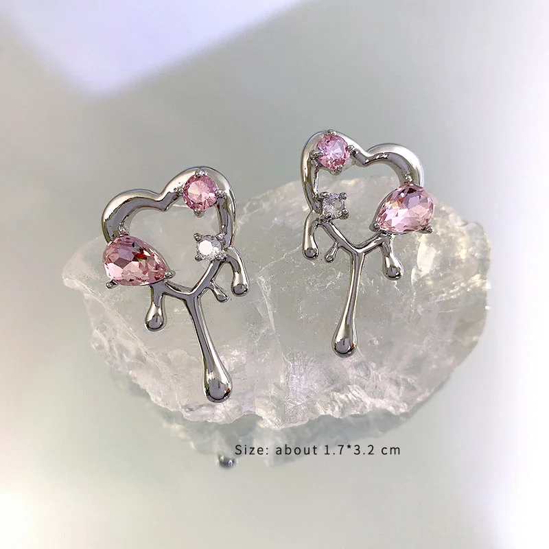 Pink Heart-Shaped Fluid Ear Studs