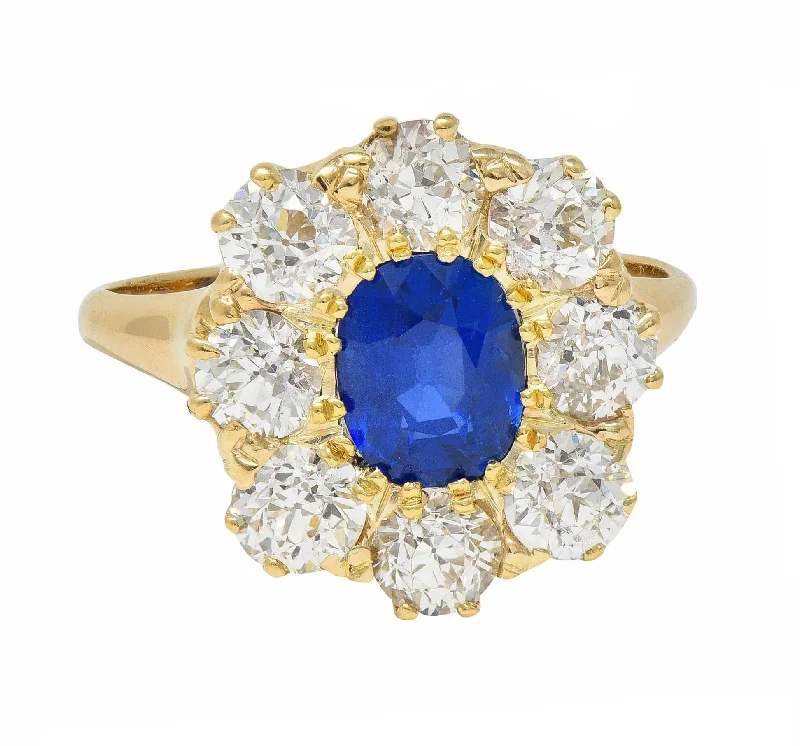 Victorian 3.20 CTW No Heat Burma Sapphire Diamond 14 Karat Yellow Gold Antique Halo Ring GIA